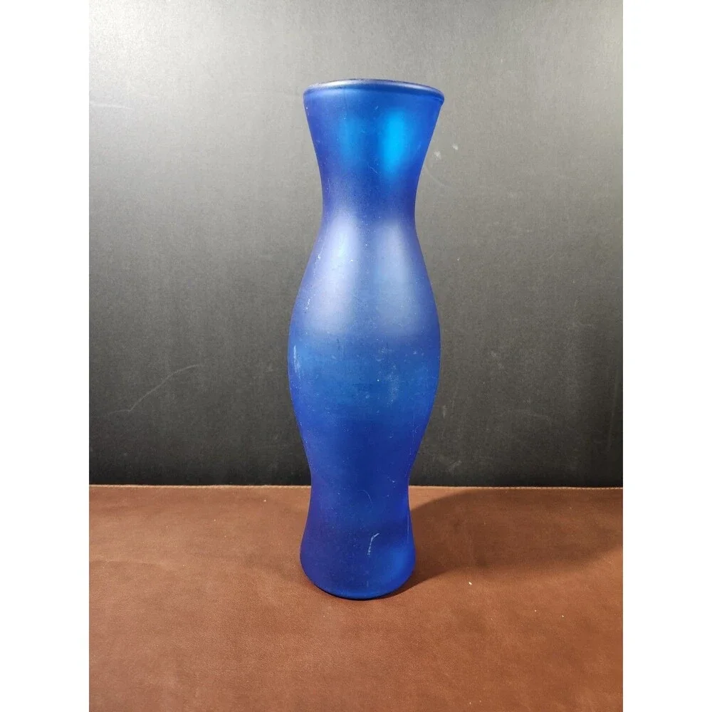 IKEA Salong blue glass vase, designed by Johanna Jelinek, features a...